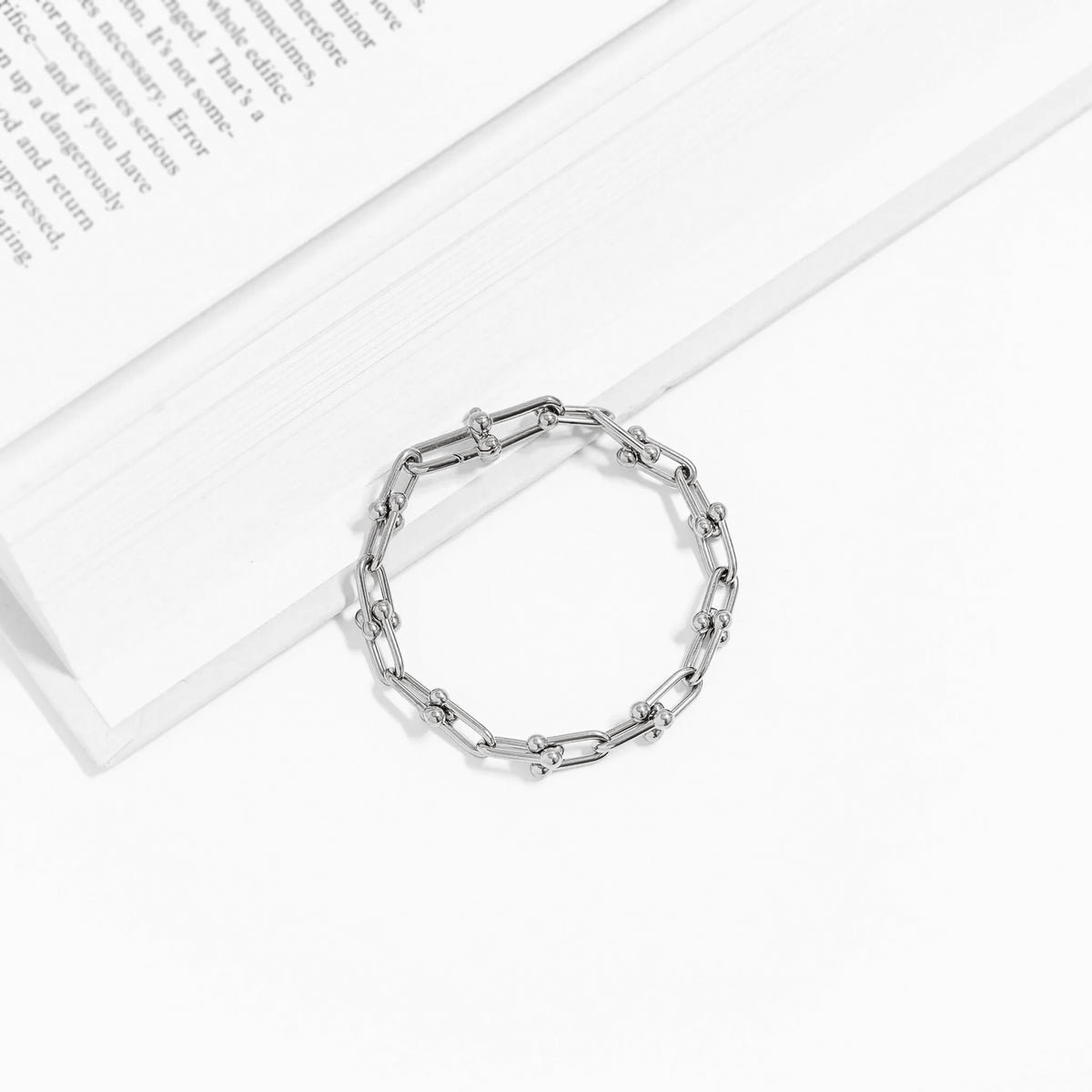 ORRÉ Hardware Chain Bracelet in gold — styled jewelry photograph