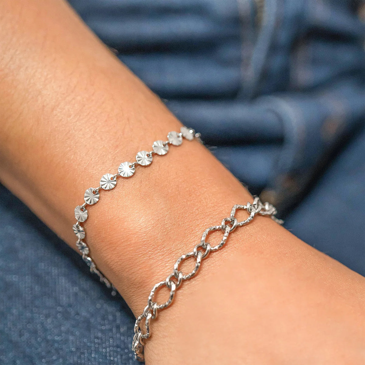 ORRÉ Sunburst Chain Bracelet in silver — styled jewelry photograph