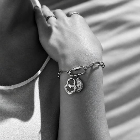ORRÉ Paperclip Carabiner Bracelet in gold — styled jewelry photograph