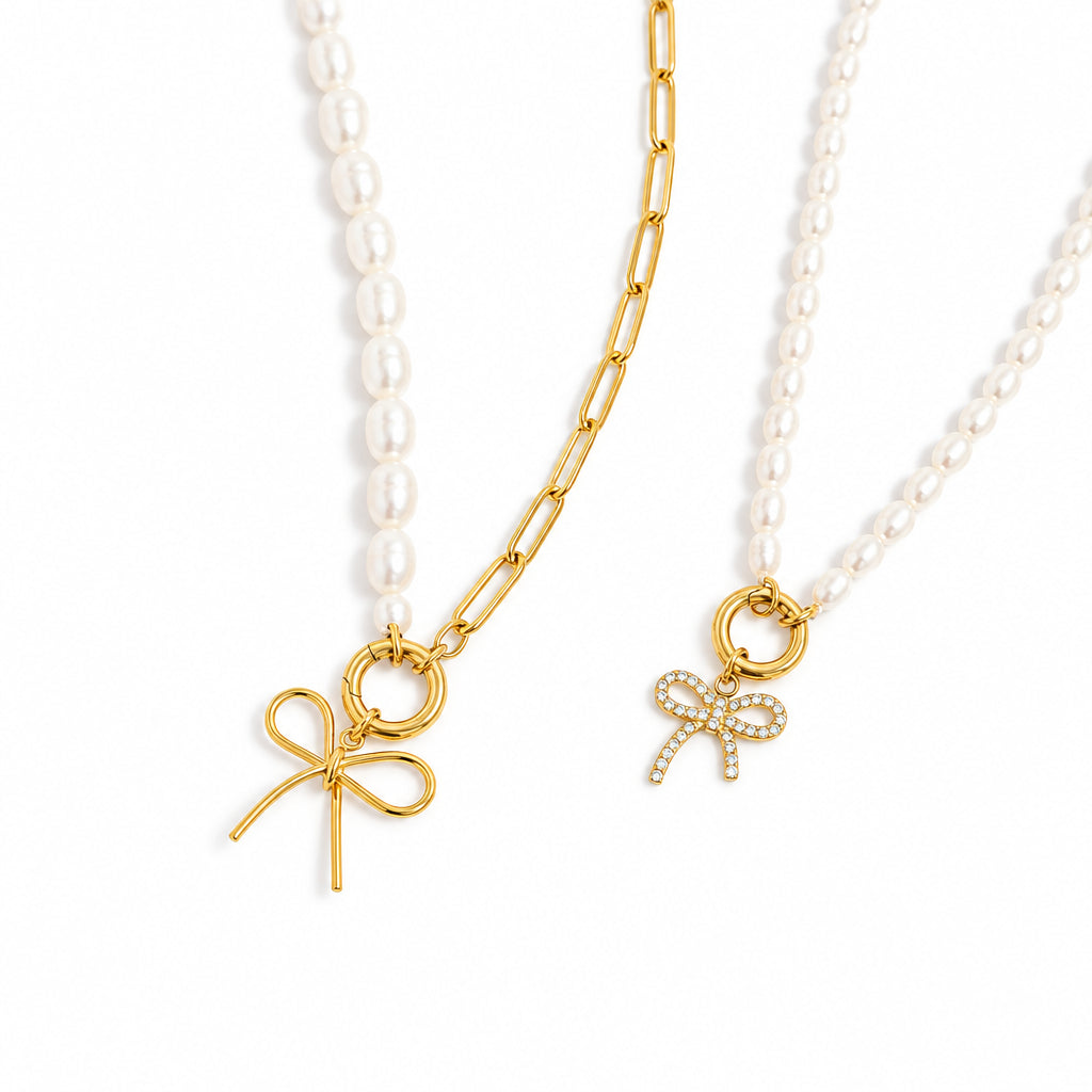 ORRÉ Rhinestone Bow Charm — styled jewelry photograph