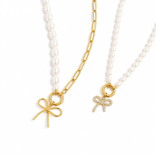 ORRÉ Rhinestone Bow Charm — styled jewelry photograph