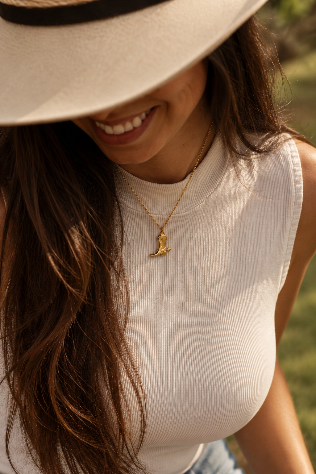 ORRÉ cowboy boot charm styled on a model
